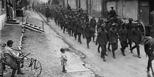 Boche prisoners captured by Canadians on Hill 70 are paraded through town. August, 1917. Photo: Dept. of National Defence / LAC, MIKAN no. 3395589.