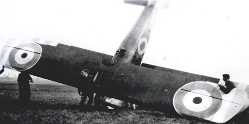 Royal Flying Corps crew check the condition of a downed Allied biplane circa 1917. Crash landings were one of the many hazards faced by airmen during the war.