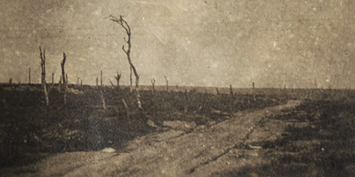 Not much is left of the countryside and road after heavy shelling. The burnt and barren landscape is haunting.