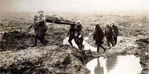 Wounded Canadians on way to aid-post during the Battle of Passchendaele. Photo: William Rider-Rider / LAC, MIKAN no. 3397044.